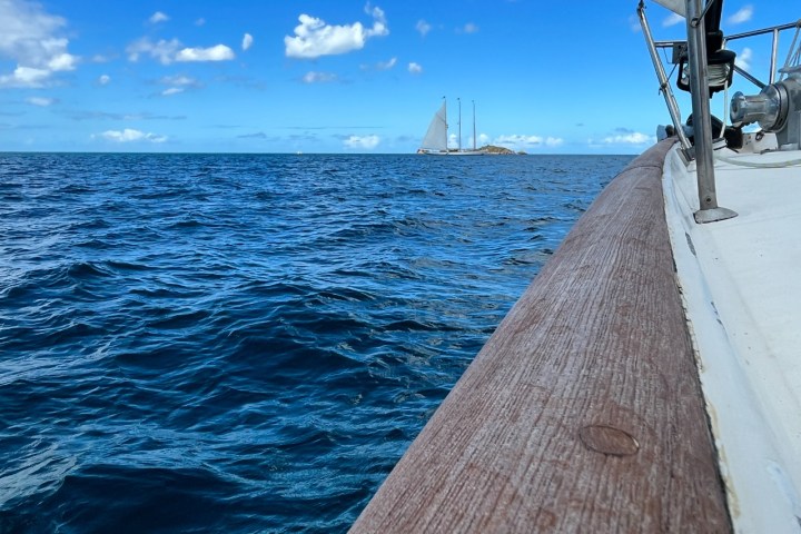 a wooden boat in a body of water