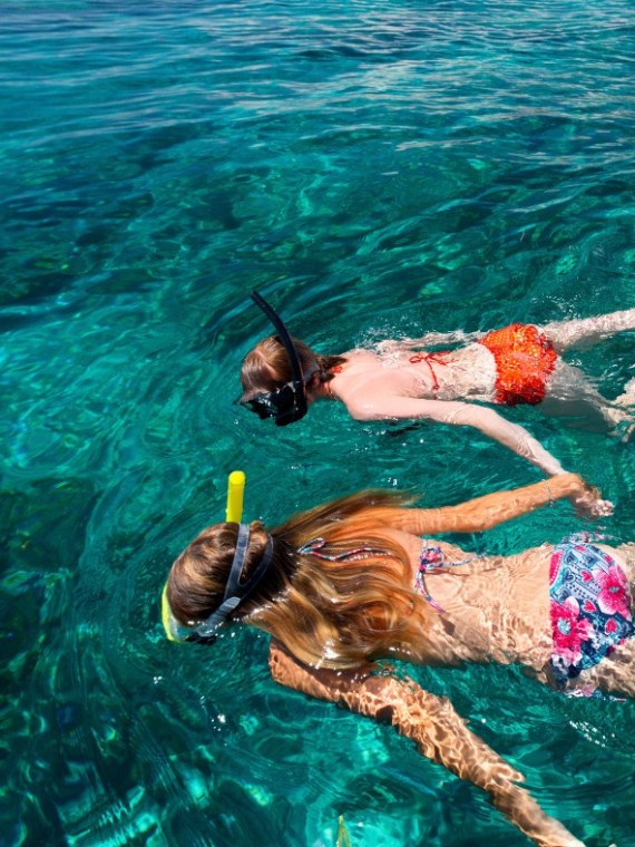 a person swimming in a body of water