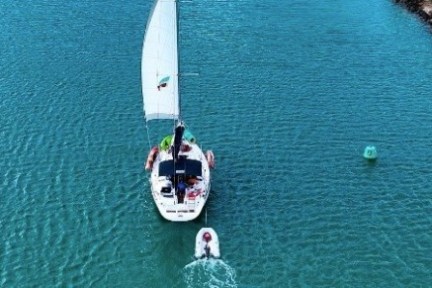 a small boat in a body of water