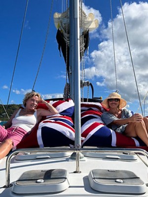 a group of people riding on the back of a boat